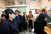 公務員事務局局長羅智光（前右）到訪食物環境衞生署，了解部門在提升食物安全及改善環境衞生的工作。期間他與屍體處理隊的人員會面